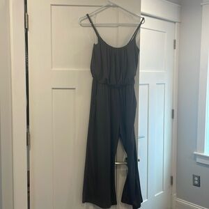 Cropped jumpsuit with flared leg.